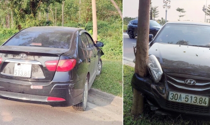 Ảnh TNGT: Hyundai Avante 30A 51384 leo vỉa hè, đâm toạc gốc cây