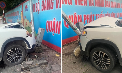 Ảnh TNGT: Không làm chủ tốc độ, tài xế BAIC Q7 BKS 12A 12537 lao lên vỉa hè đâm gục cột điện