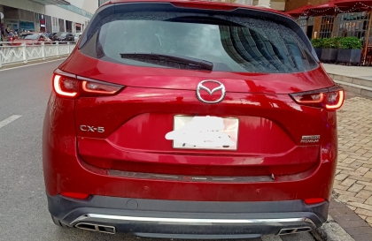 Đèn đuôi xe Mazda CX-5 tự sáng là sao các bác nhỉ?