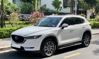 Thước lái xe Mazda CX-5 bị kêu khi đi vào chỗ xóc là sao?