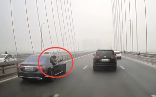 Ý thức Giao thông: CLB xe sang Mercedes-Benz E-class và Toyota Land Cruiser dàn hàng ngang quay phim trên cầu Nhật Tân