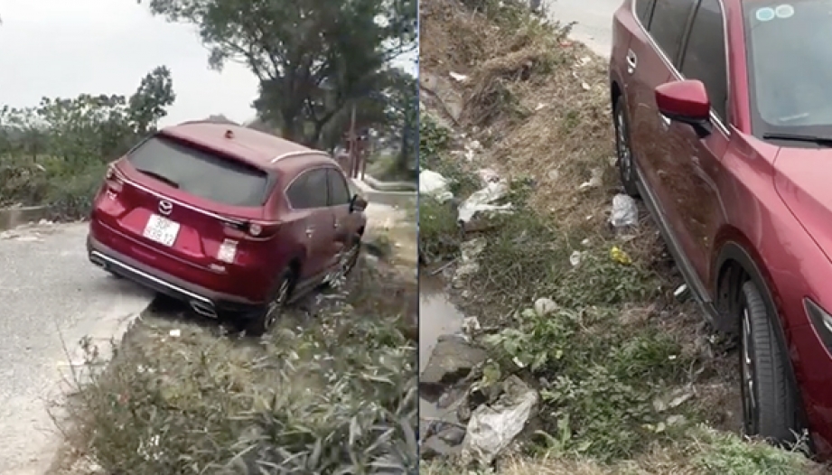 Clip TNGT: Tài xế Mazda CX-8 lơ đễnh để xe tụt chân xuống cống