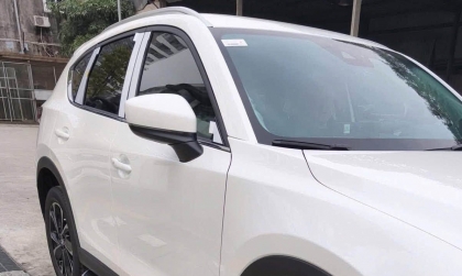 Mazda CX-5 bị lỗi gập gương thì sửa thế nào các bác?