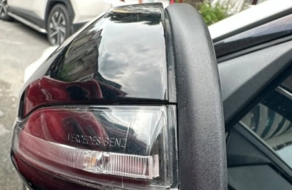 Xe GLC không cụp gương được khi ấn chìa kháo cửa thì phải làm sao?