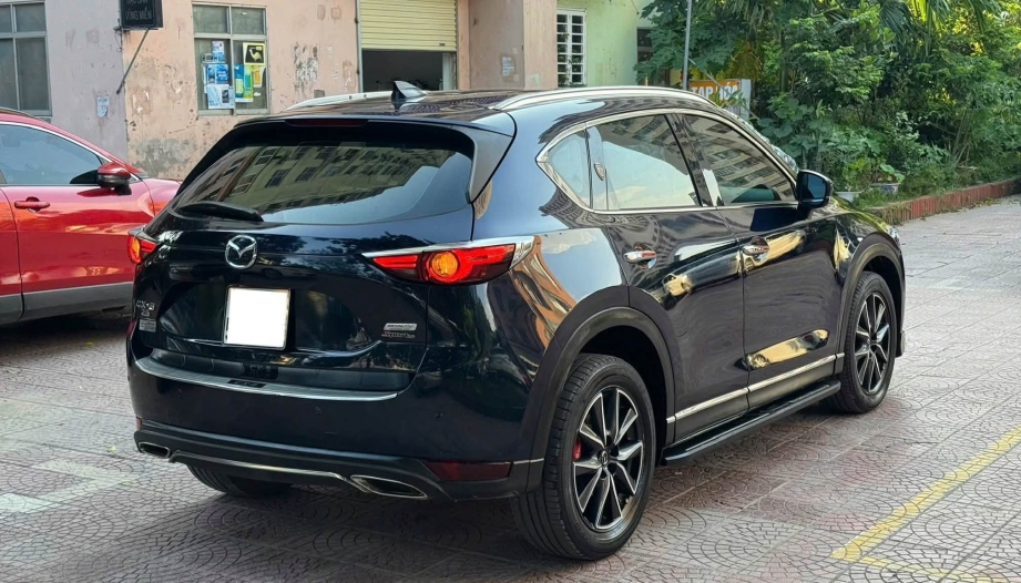 Vì sao xe Mazda CX-5 tự mở cốp sau khi tắt máy?
